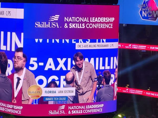 2-Arik-Edstrom-being-awarded-gold-medal-at-2023-SkillsUSA-Nationals-for-CNC-5-Axis-Milling-Programmer