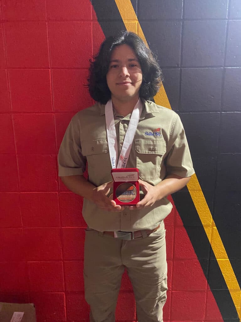 4-Luciano-Calvillo-with-his-bronze-medal-for-winning-3rd-in-the-nation-in-Electrical-Construction-Wiring_2023-SkillsUSA
