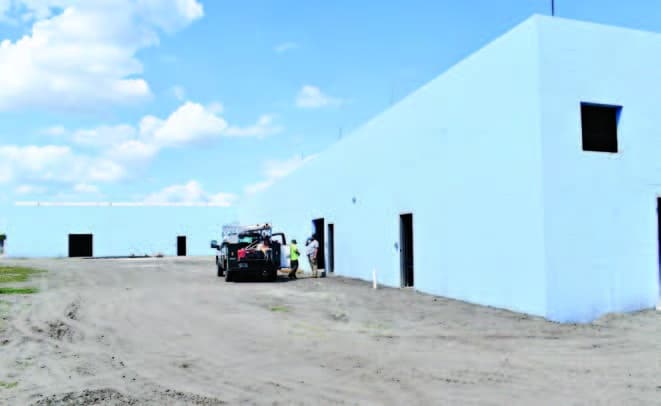 An aircraft hangar will be built behind the school.