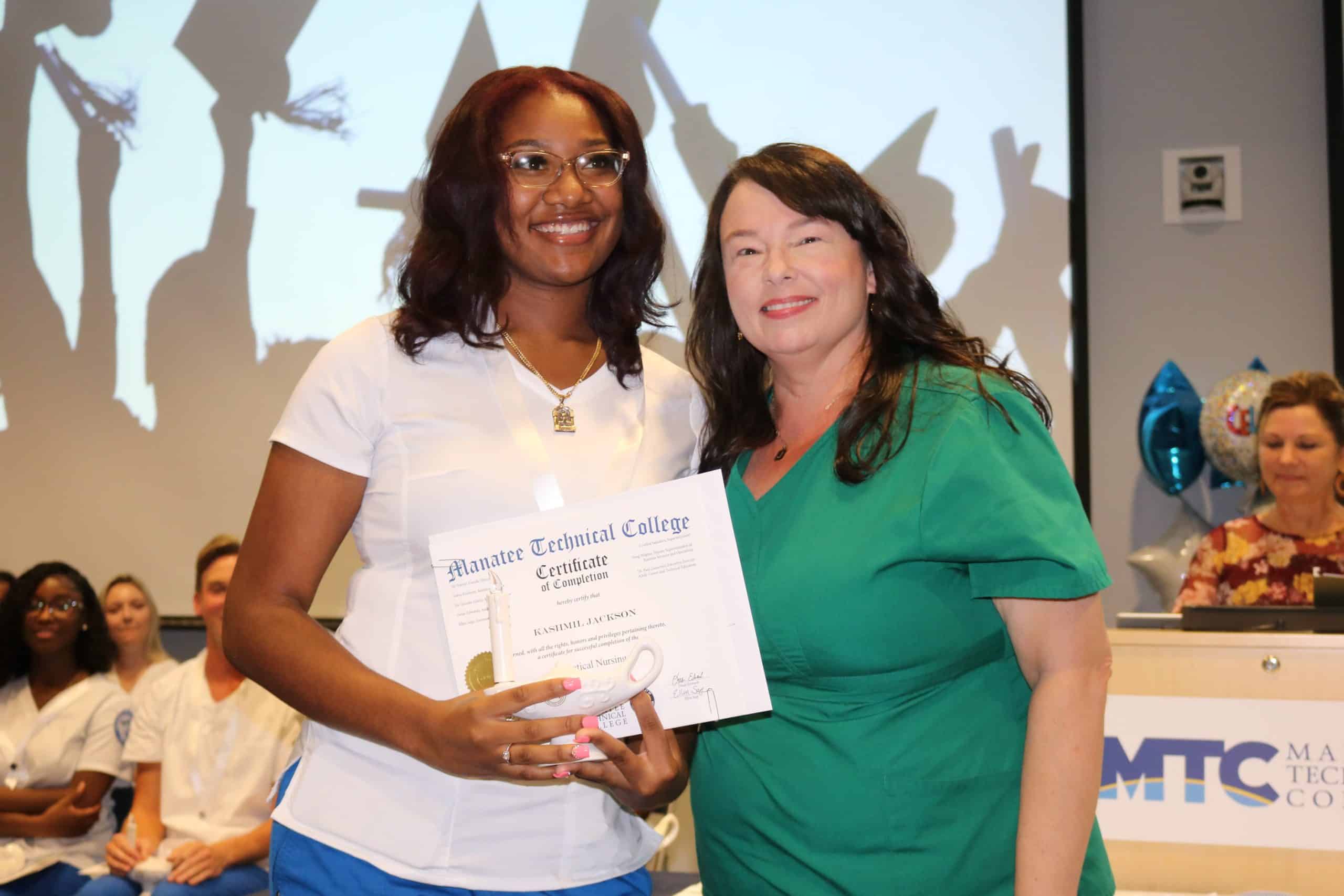 Kashmil Jackson and nurse instructor Julie Mardones; 28 Manatee Technical College nursing grads were pinned in an official ceremony June 29, 2022