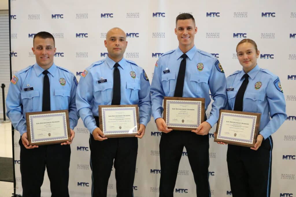 Law enforcement grad award winners Riley Cox Johnathan Carrier Josiah Hartsell and Irene Gallardo