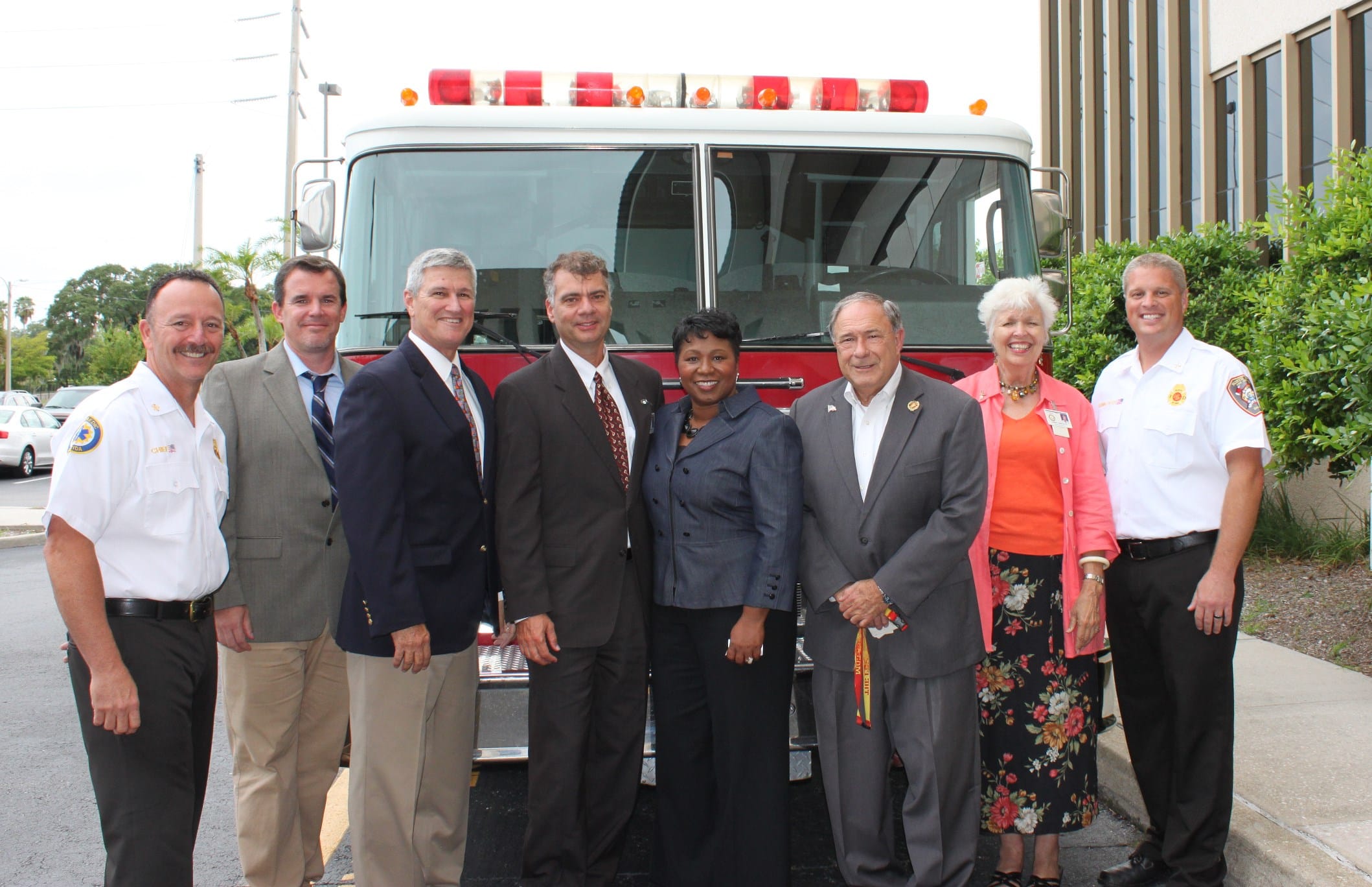 NR donates simulator, poses in front of CH engine